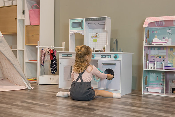 Die Waschmaschine offen.