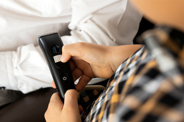 Mit mechanischer Schermaschine