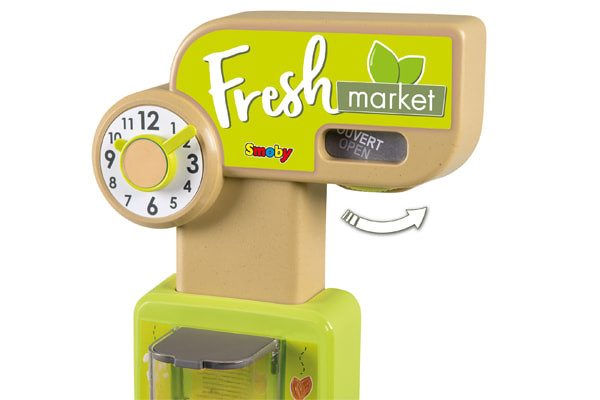 Eröffnungsschild und Uhr